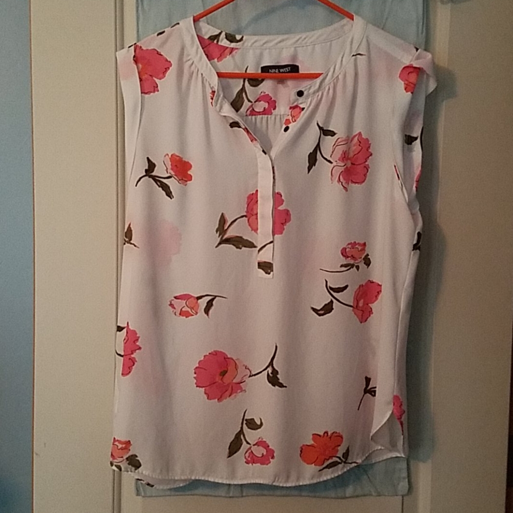 White floral sleeveless blouse